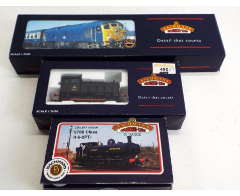 Three Bachmann 00 gauge boxed locomotives, class 24 diesel, diesel shunter and Collett class locomotive 