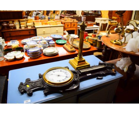 An oak barometer for restoration; and a brass Corinthian column table lamp