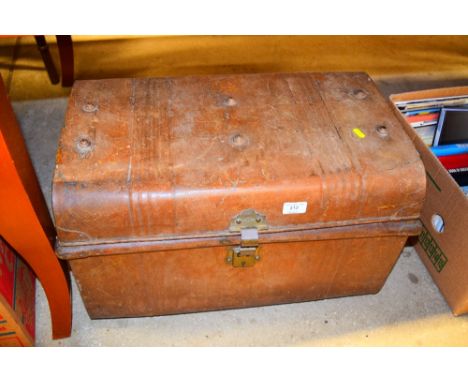 A tin trunk 