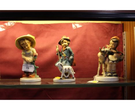Three Goebel style figures