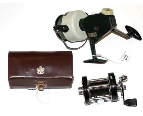 An ABU Ambassadeur 6000C multiplier reel, with oil bottle and tools, original leather case; and an ABU Cardinal 77 spinning r
