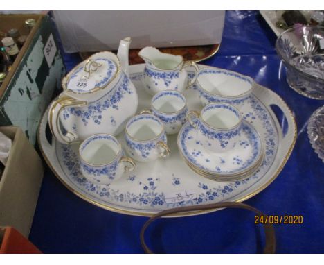 CABARET SET OF CHINA MADE BY GEORGE JONES IN THE BON-BON PATTERN COMPRISING TRAY, TEA POT, MILK JUG, SUGAR BOWL AND FOUR CUPS