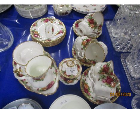 GROUP OF ROYAL ALBERT OLD COUNTRY ROSE TEA SET INCLUDING CUPS AND SAUCERS, SMALL OVAL TRAY, MILK JUG, SUGAR BOWL AND SIDE PLA