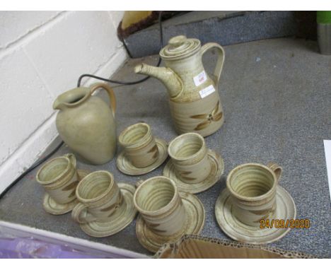 STUDIO POTTERY TYPE COFFEE POT AND SIX CUPS AND SAUCERS WITH A BROWN LEAF DESIGN