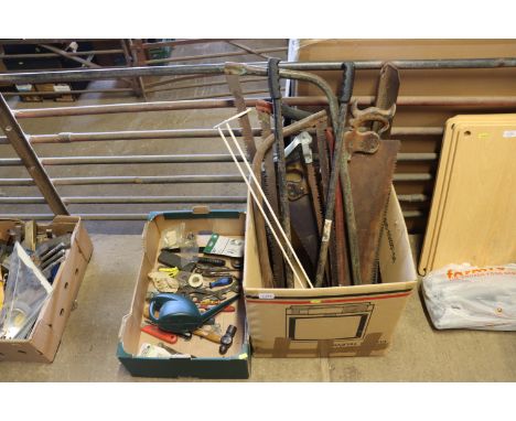 Two boxes of various saws and hand tools