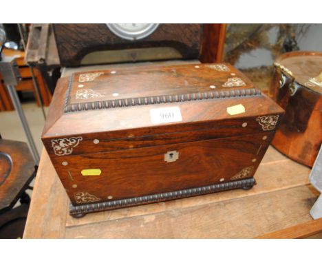 A 19th Century rosewood and mother of pearl inlaid sarcophagus tea caddy 