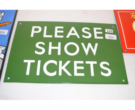 A reproduction 'Please Show Ticket' sign (169)