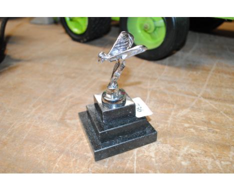 A reproduction Spirit of Ecstasy style car mascot raised on step base (15)