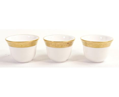 De Lamerie Fine Bone China heavily gilded Tea Bowls, specially made high end quality item, Made in England, height 4cm (3) 
