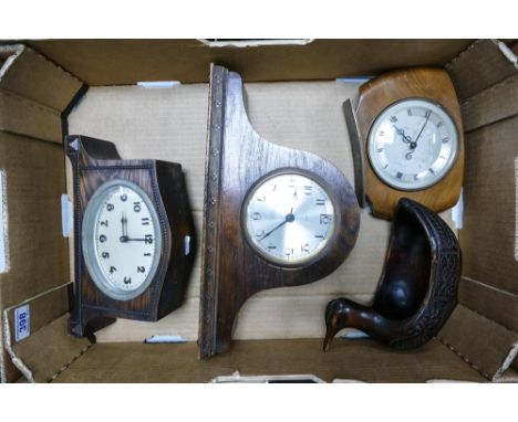A collection of vintage wooden cased mantle clocks 