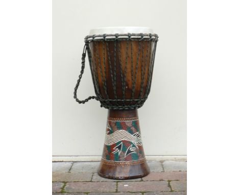 An African Bongo Drum with skin top and painted decoration. Height: 61cm 