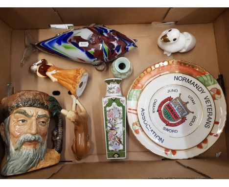 A mixed collection of ceramic items to include large Royal Doulton character jug, Oriental vase, art glass fish, wall plates 