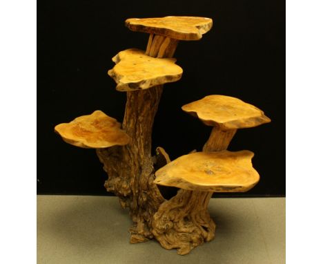 A five tier tree trunk stand