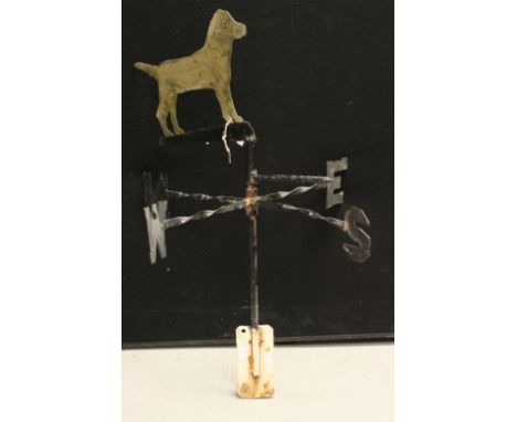 An early 20th century weather vane, painted hound