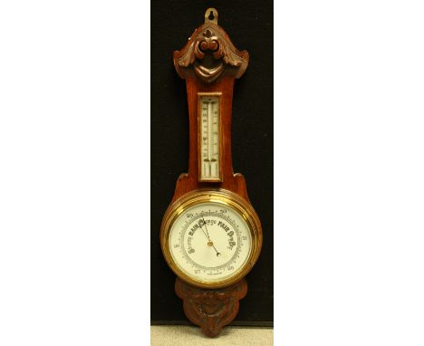 An early 20th century oak aneroid barometer