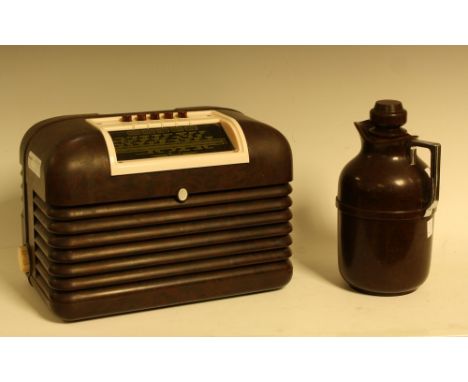 A Bakelite radio, by Bush; a Bakelite flask (2)