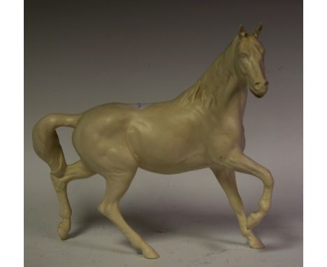 A Beswick model of a horse, leg up, head up, white matt colourway