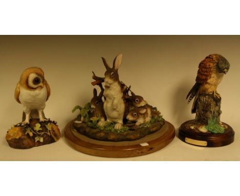 Ceramics - a Royal Crown Derby model of a Barn Owl, approximately 26cm in height; a Royal Doulton model of a Kestrel, limited