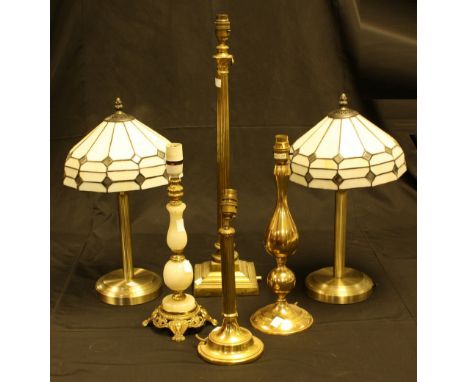 A brass table lamp base, Corinthian column, approx 62cm in height; another similar; a pair columnar table lamps, glass leaded