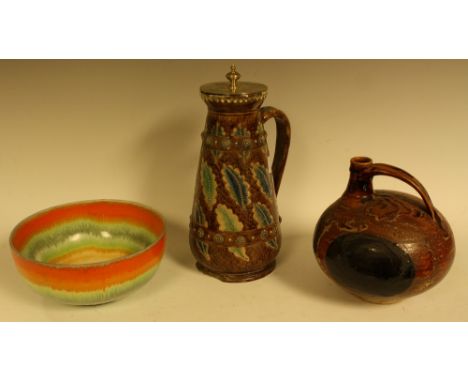 A 19th century Hugo Lonitz &amp; Co. majolica covered jug, 30cm high; a Shelly Harmony drip ware bowl; an art pottery flask w