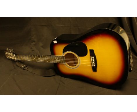 A Fender Squier acoustic guitar