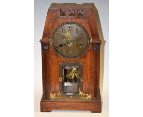 An Arts &amp; Crafts mahogany cased architectural mantel clock