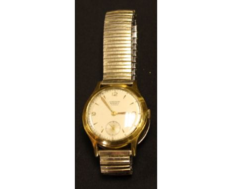 Junghans - a vintage 1950s automatic wristwatch, textured dial, Arabic numerals and arrow baton markers, subsidiary seconds, 