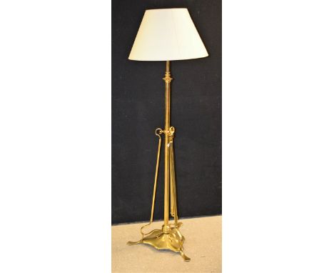 An Art Nouveau brass standard lamp, c.1910