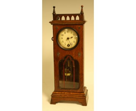 A miniature oak mantle timepiece as a longcase clock, c.1920