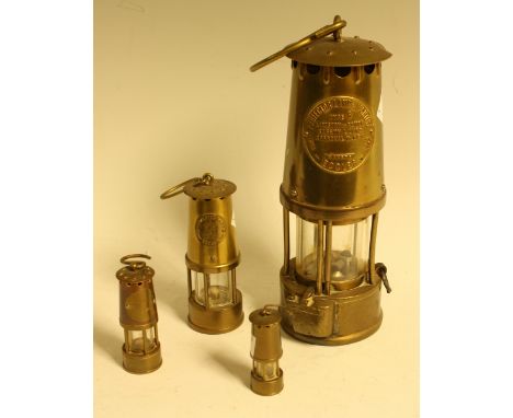 An Eccles type 6 miner's safety lamp; other miniatures (4)