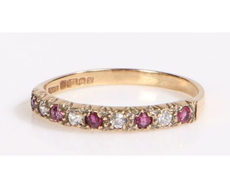 9 carat gold ruby and paste half eternity ring, the head set with alternating ruby and paste stones, ring size L weight 1.2 g