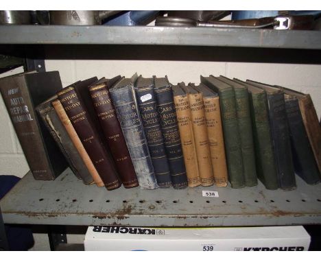 A shelf of early motoring and mechanic related books.