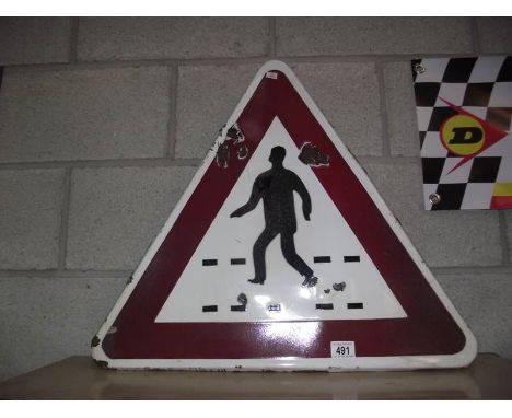 An enamel crossing warning triangle road sign.