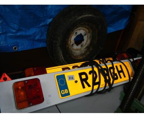 2 trailer light boards and an 8" trailer wheel.