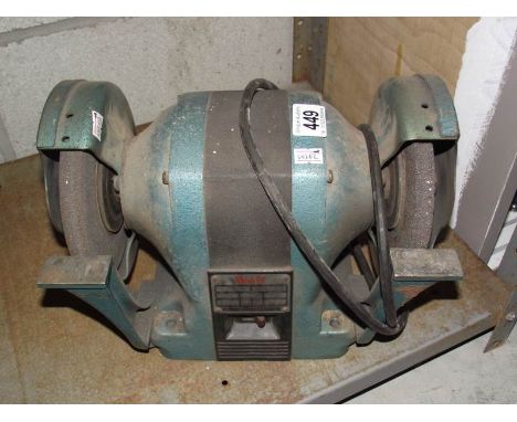 A Wolf bench grinder.