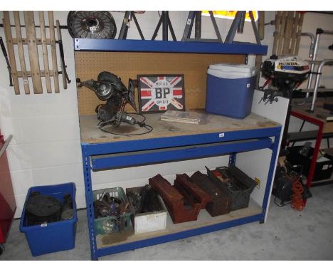 A metal framed work bench.