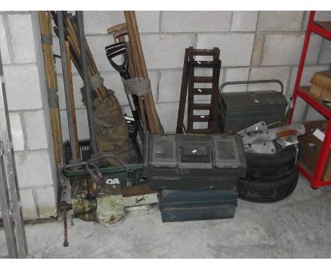 A mixed lot including ramps, winch, tool boxes, large bench vice etc.,