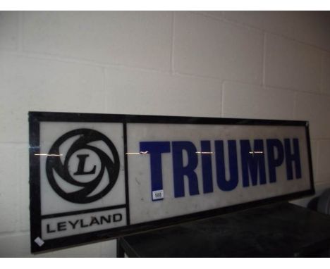A large 1970's Leyland Triumph plastic dealer light board sign panel, a/f.