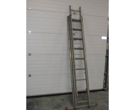 A triple extending aluminium ladder.