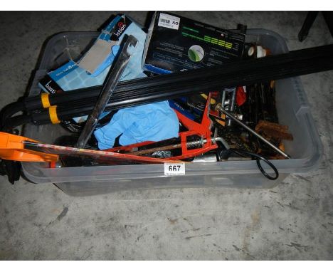 A box of old tools including jack saws, roof bars etc.,