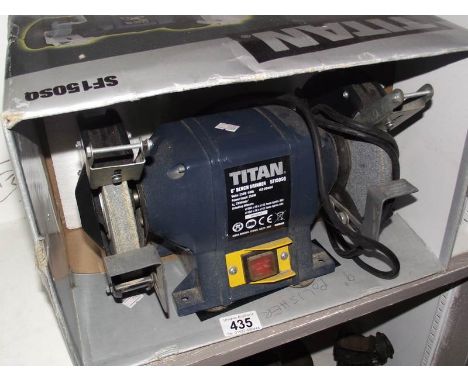 A Tital 6" bench grinder.