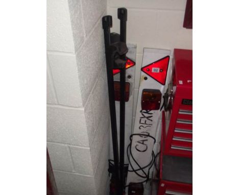2 trailer light boards and a pair of Thule roof bars.