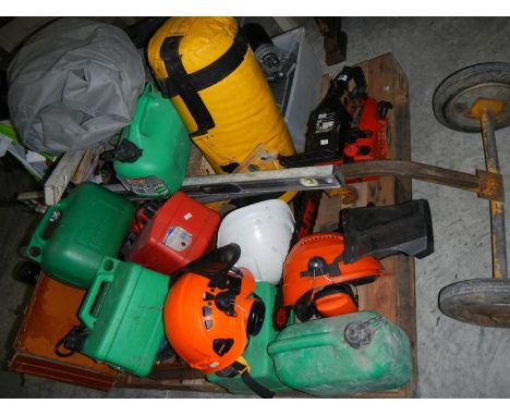 Pallet contents including chain saw, fuel cans, tools etc.,