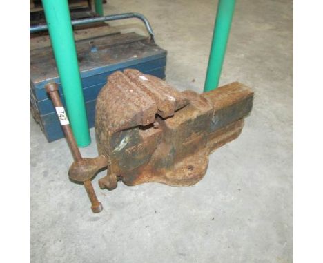 A large old bench vice.