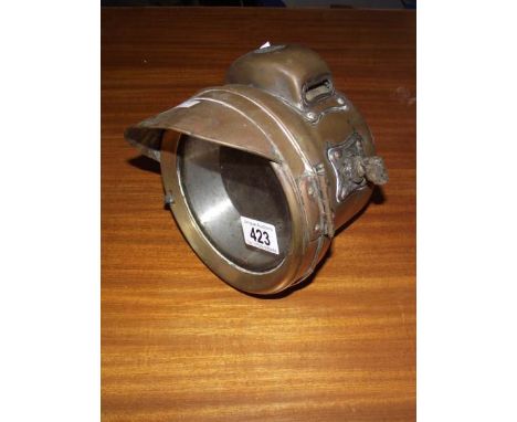 A vintage brass headlamp by Powell &amp; Hammer Ltd., Birmingham, a/f.