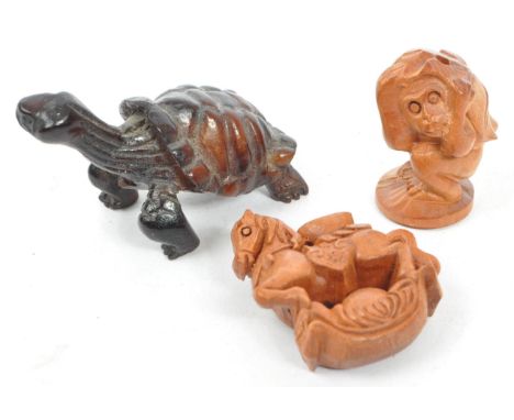 A collection of 19th century Japanese netsuke carved wooden figures. Comprising of a turtle, monkey and rocking horse. 4cm ta