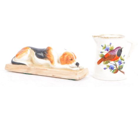 A 19th century circa 1878 Royal Worcester ceramic hand painted small barrel jug, alongside a mid 20th century Doris Lindner f