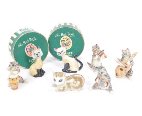 Wade of England - A collection of 20th century porcelain cat figures. Including Wade of England Lady and the Tramp Si and Am 