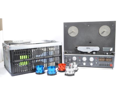 Revox - A vintage 20th century Revox B 77 Mk II stereo tape recorder reel to reel player. Having a two turning rod, with a co