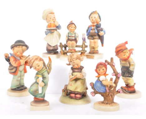 Goebel - A collection of West German Goebel porcelain china figurines. Depicting young children, playing instruments, craftwo